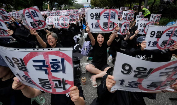 South Korea passes law to protect rights of teachers after mass protests over abuse from parents